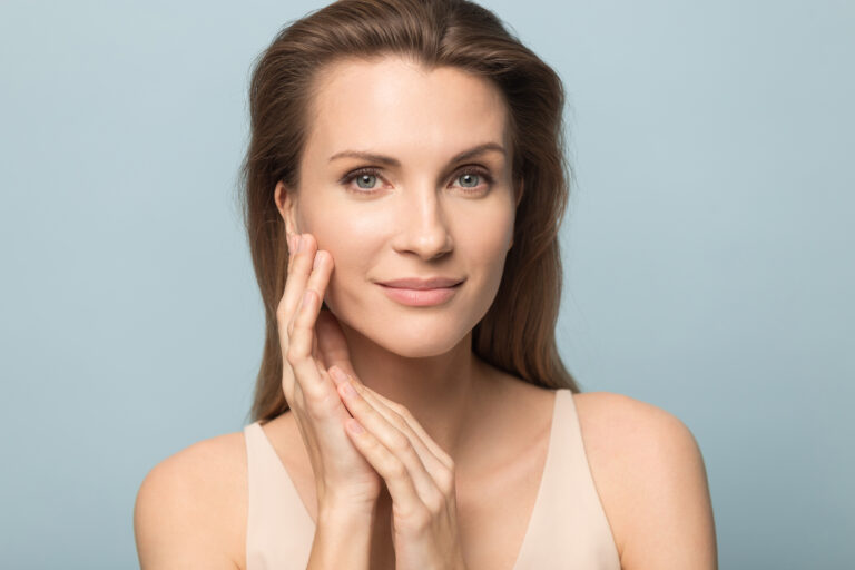 Portrait of beautiful woman touch healthy clean skin